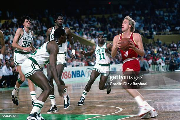 Craig Ehlo of the Houston Rockets drives to the basket against the Boston Celtics during the 1986 NBA Finals at the Boston Garden in Boston,...