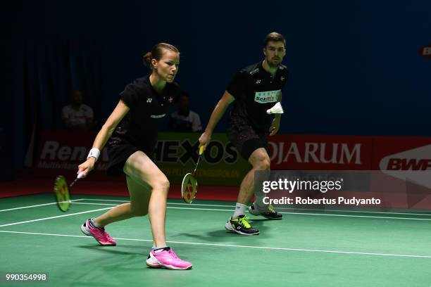 Mathias Christiansen and Christinna Pedersen of Denmark compete against Sam Magee and Chloe Magee of Ireland during Mixed Doubles Round 1 on day one...