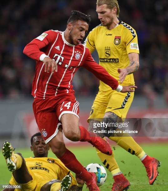 Munich's Corenti Tolisso in action against Grossaspach's Kai Gehring during the soccer friendly match between FC Bayern Munich and SG Sonnenhof...