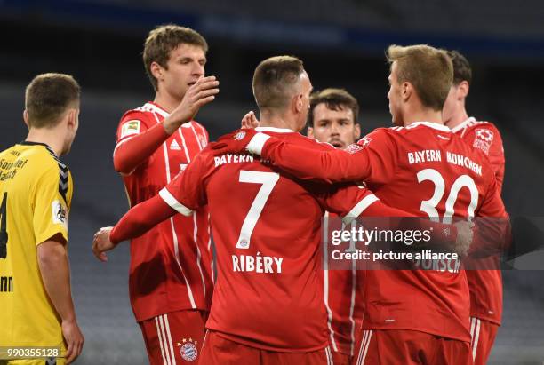 Munich's goal scorer Franck Ribery and his team mates celebrate the 4-3 score during the soccer friendly match between FC Bayern Munich and SG...