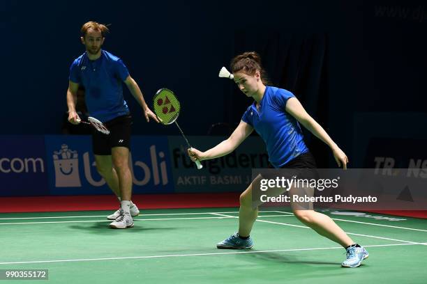 Sam Magee and Chloe Magee of Ireland compete against Mathias Christiansen and Christinna Pedersen of Denmark during Mixed Doubles Round 1 on day one...