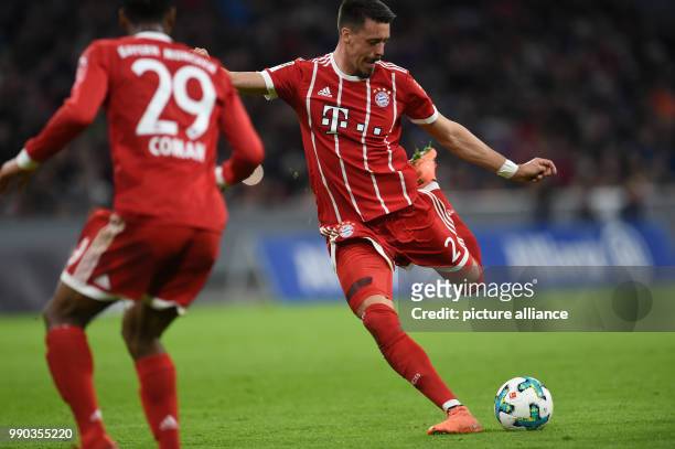 Munich's Sandro Wagner passes the ball during the soccer friendly match between FC Bayern Munich and SG Sonnenhof Grossaspach at the Allianz Arena in...