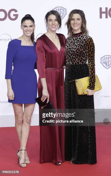 The actresses Lisa Tomaschewsky , Anne Schaefer and Christina Hecke arrive for the world premiere of the film "Hot Dog" in Berlin, Germany, 09...