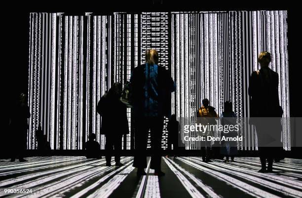 People view Ryoji Ikeda's latest installation 'Micro | Macro' at Carriageworks on July 3, 2018 in Sydney, Australia.