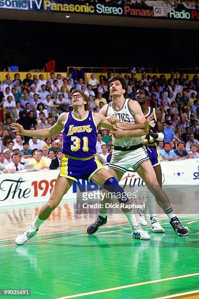 Kurt Rambis of the Los Angeles Lakers boxes out against the Boston Celtics during the 1987 NBA Finals at the Boston Garden in Boston, Massachusetts....