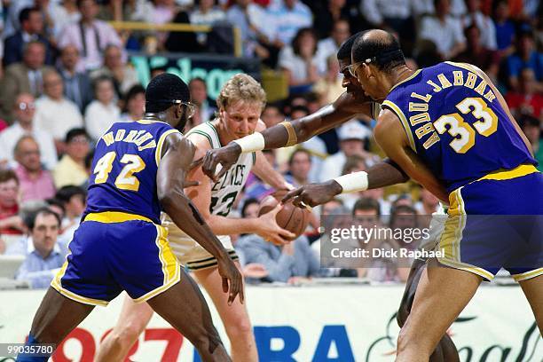 Larry Bird of the Boston Celtics looks to make a move against James Worthy of the Los Angeles Lakers during the 1987 NBA Finals at the Boston Garden...