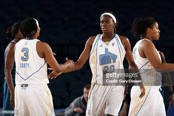 Dominique Canty and Shameka Christon of the Chicago Sky celebrate a play during the preseason WNBA game against the Minnesota Lynx on May 6, 2010 at...
