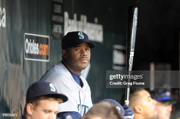 Ken Griffey Jr. #24 of the Seattle Mariners sits in the dugout during the game against the Baltimore Orioles at Camden Yards on May 11, 2010 in...