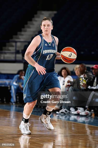 Lindsay Whalen of the Minnesota Lynx drives the ball upcourt during the preseason WNBA game against the Chicago Sky on May 6, 2010 at the AllState...