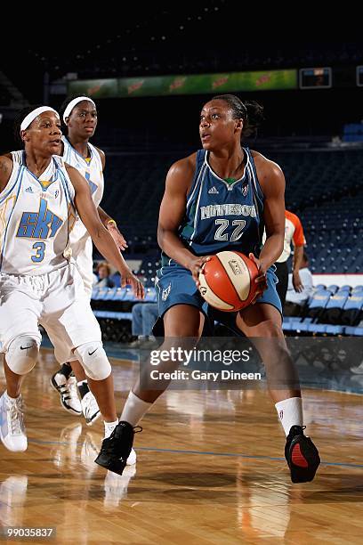 Monica Wright of the Minnesota Lynx looks to shoot over Dominique Canty of the Chicago Sky during the preseason WNBA game on May 6, 2010 at the...