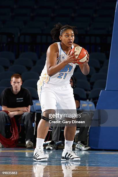 Abi Olajuwon of the Chicago Sky looks to pass during the preseason WNBA game against the Minnesota Lynx on May 6, 2010 at the AllState Arena in...