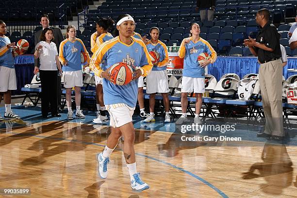 Tamera Young of the Chicago Sky runs onto the court before the preseason WNBA game against the Minnesota Lynx on May 6, 2010 at the AllState Arena in...