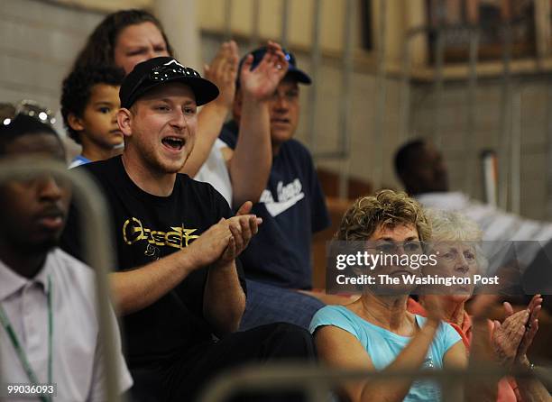 May 1: K.C. Marshall, left in black, cheers with his mom Shari Krantz, center, and grandmother Cheryl McCullen, right, for his sister Amy Marshall...