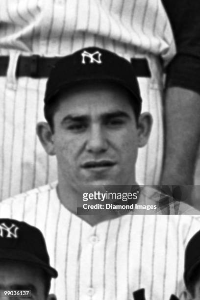 Catcher Lawrence Peter Yogi Berra of the New York Yankees poses with his teammates for a group portrait prior to a game on Spetember 17, 1947 against...