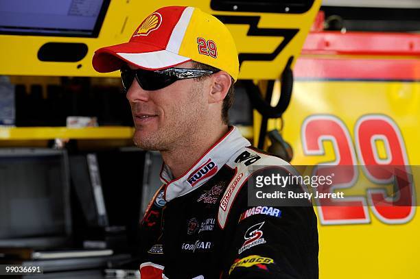 Kevin Harvick, driver of the Shell / Penzoil Chevrolet, looks on in the garage during practice for the NASCAR Sprint Cup Series Showtime Southern 500...