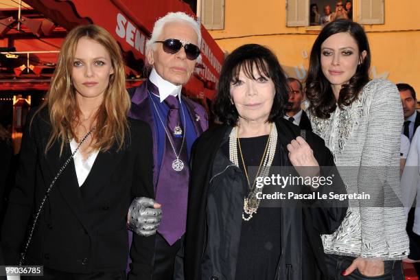 Singer Vanessa Paradis, Karl Lagerfeld, singer Juliette Greco and actress Anna Mouglalis pose during the Chanel Cruise Collection Presentation on May...