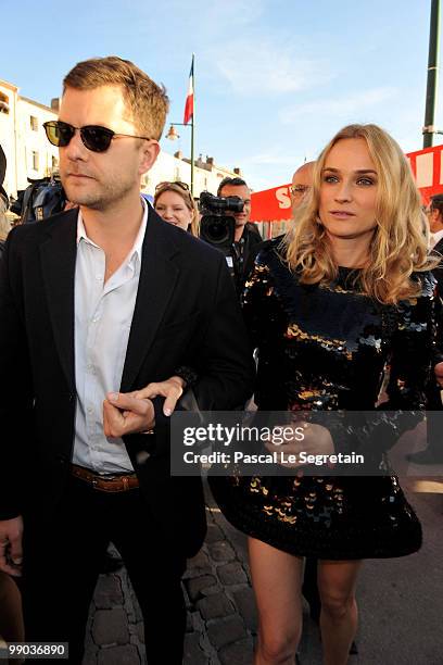 Actors Joshua Jackson and Diane Kruger attend the Chanel Cruise Collection Presentation on May 11, 2010 in Saint-Tropez, France.