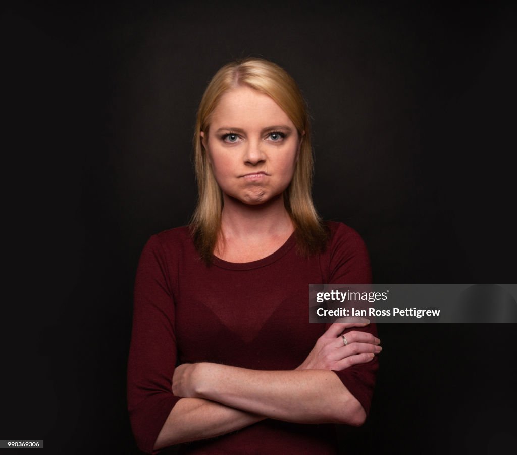 Blond woman making a face