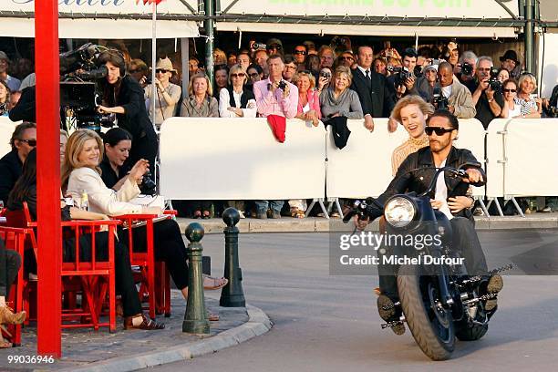 Georgia Jagger and Seb ride on a Harley Davidson at the Chanel Cruise Collection Presentation on May 11, 2010 in Saint-Tropez, France.