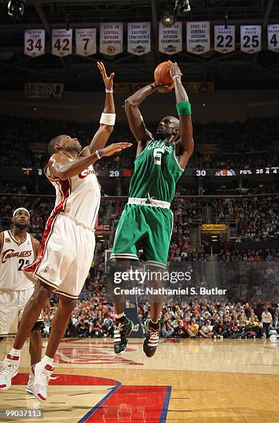 Kevin Garnett of the Boston Celtics shoots against Antawn Jamison of the Cleveland Cavaliers in Game Five of the Eastern Conference Semifinals during...