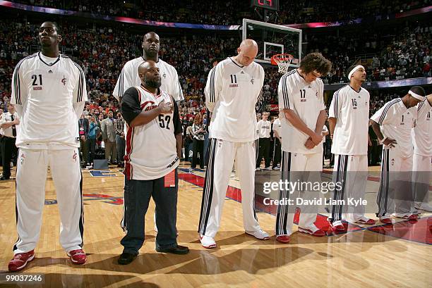 Shaquille O'Neal of the Cleveland Cavaliers stands behind Raymond Towler, who was released from prison a week ago after 29 years when DNA tests...