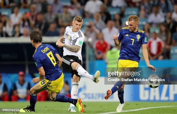 Toni Kroos of Germany Albin Ekdal of Sweden Sebastian Larsson of Sweden during the 2018 FIFA World Cup Russia group F match between Germany and...