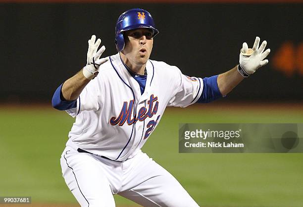 Ike Davis of the New York Mets reacts after a foul ball was called on what he thought was a homerun in the eighth inning against the Washington...