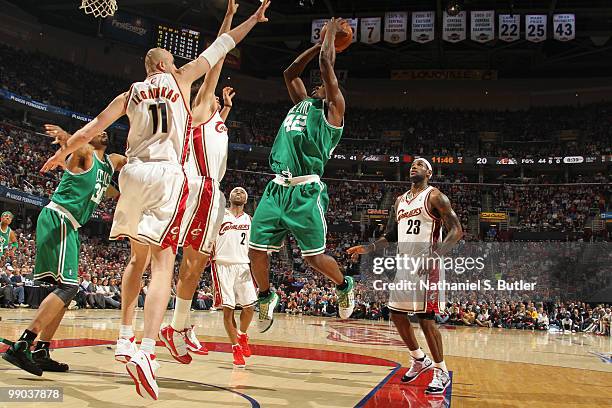 Tony Allen of the Boston Celtics shoots against Zydrunas Ilgauskas and Anderson Varejao of the Cleveland Cavaliers in Game Five of the Eastern...