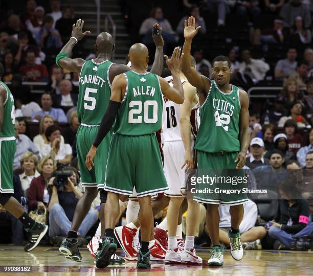 Ray Allen of the Boston Celtics reacts after a fourth quarter basket with Kevin Garnett and Tony Allen while playing the Cleveland Cavaliers in Game...