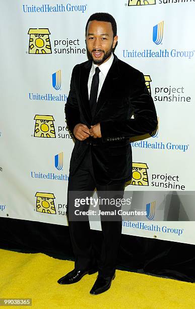 Singer John Legend poses for photos at the 7th Annual Project Sunshine Benefit at The Waldorf Astoria on May 11, 2010 in New York City.