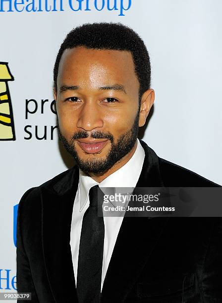 Singer John Legend poses for photos at the 7th Annual Project Sunshine Benefit at The Waldorf Astoria on May 11, 2010 in New York City.