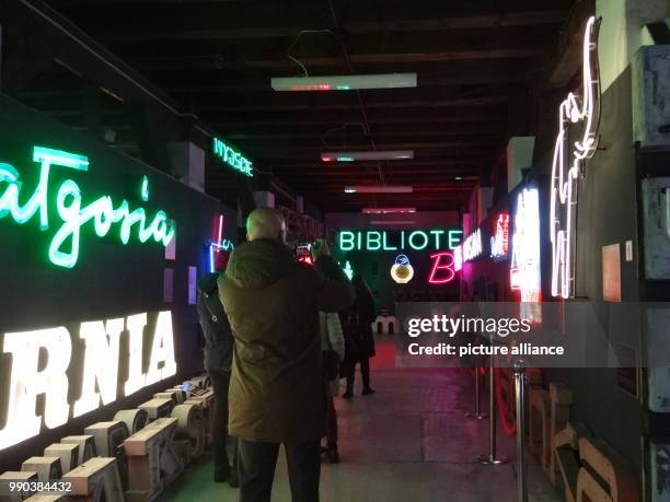 Neon signs shining in an exhibition of restored lighting advertisements from the 50s through to the 70s in Europe's one-and-only Neon Museum in the...