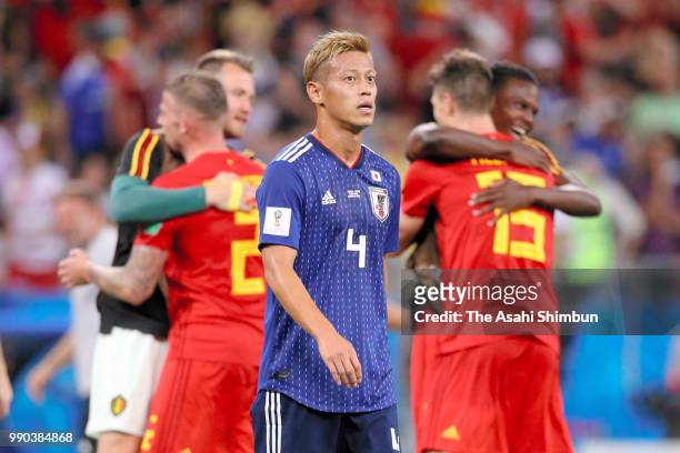 Keisuke Honda of Japan leaves the pitch after his side's 2-3 defeat in the 2018 FIFA World Cup Russia Round of 16 match between Belgium and Japan at...