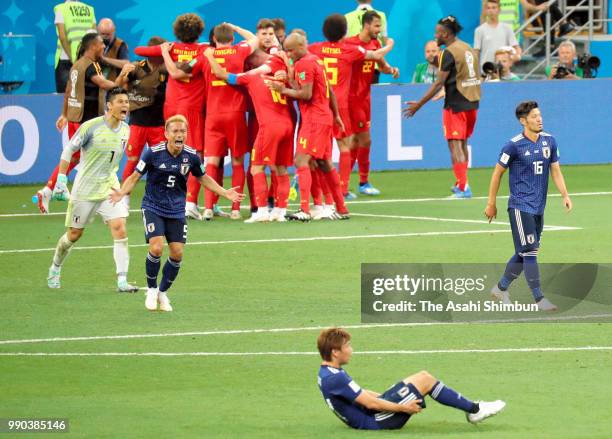 Japanese players show dejection after Belgium's third goal during the 2018 FIFA World Cup Russia Round of 16 match between Belgium and Japan at...