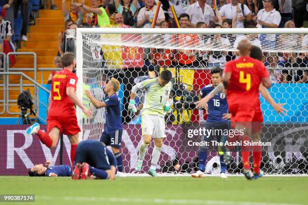 Japanese players show dejection after Belgium's third goal during the 2018 FIFA World Cup Russia Round of 16 match between Belgium and Japan at...
