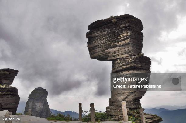 View of the iconic rock of Fanjingshan Mountain in Jiangkou county in southwest China's Guizhou province Tuesday, Sept. 11, 2012. Fanjingshan,...