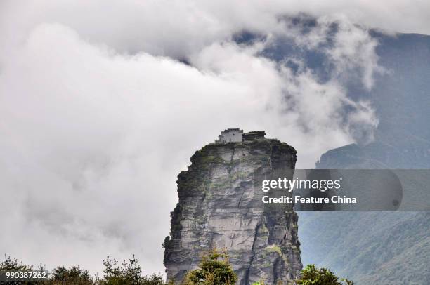 View of the iconic rock of Fanjingshan Mountain in Jiangkou county in southwest China's Guizhou province Tuesday, Sept. 11, 2012. Fanjingshan,...