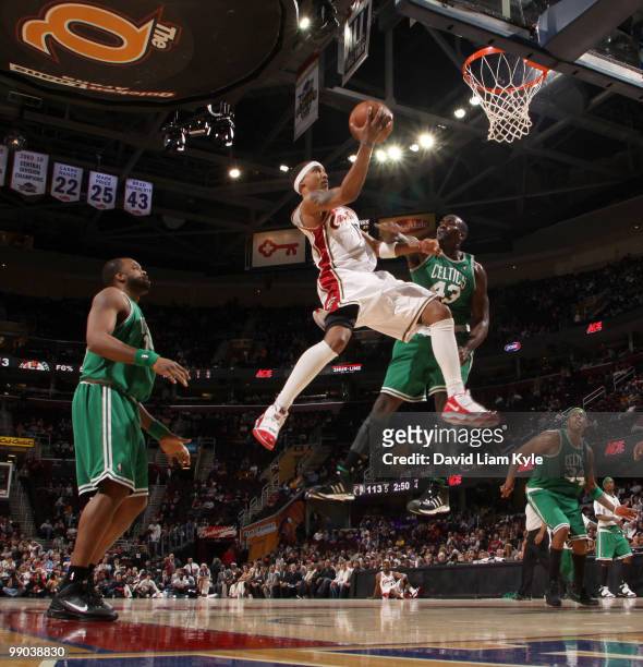 Jamario Moon of the Cleveland Cavaliers glides in for a shot against Kendrick Perkins of the Boston Celtics in Game Five of the Eastern Conference...