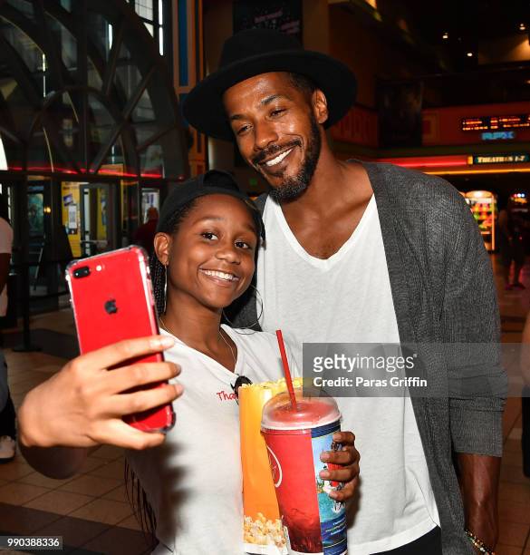 Actor McKinley Freeman takes selfie with fan at "Hit The Floor" Clips & Conversation at Regal Atlantic Station on July 2, 2018 in Atlanta, Georgia.
