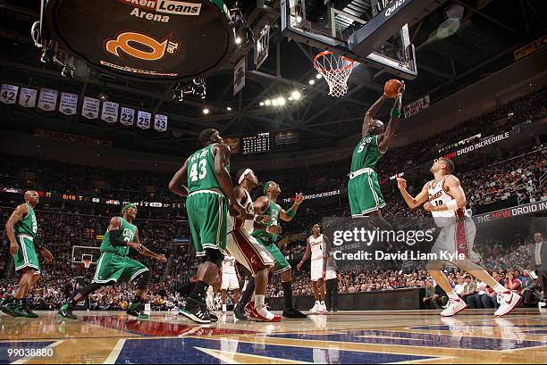 Kevin Garnett of the Boston Celtics pulls down a rebound in front of Anthony Parker of the Cleveland Cavaliers in Game Five of the Eastern Conference...