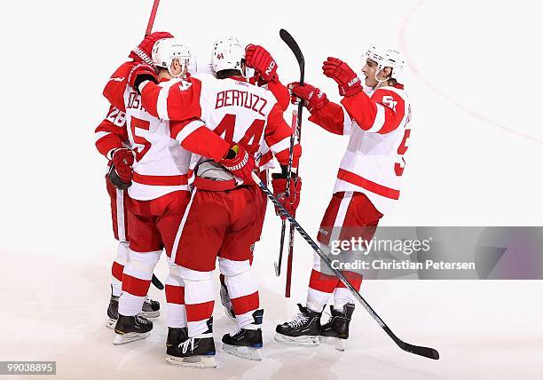 Valtteri Filppula of the Detroit Red Wings celebrates with teammates after scoring against the Phoenix Coyotes in Game Seven of the Western...