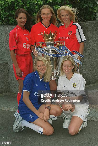 Models dressed in the strips of Liverpool, Manchester United, Arsenal, Chelsea and Leeds with the new FA Barclaycard Premiership Trophy at the Royal...