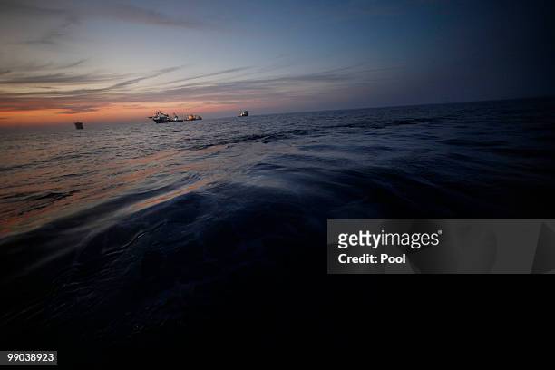 Vessels involved in the containment effort are seen at the site of the Deepwater Horizon oil spill May 11, 2010 off the coast of Louisiana in the...