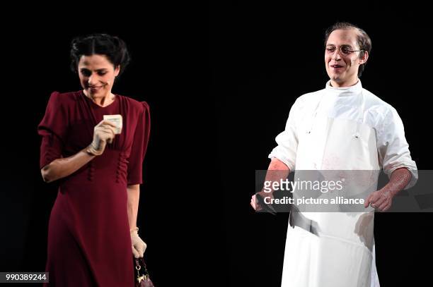 The actors Mehmet Atesci and Sesede Terziyan stand on stage during the picture rehearsal of the play 'Glaube Liebe Hoffnung' at the Maxim Gorki...