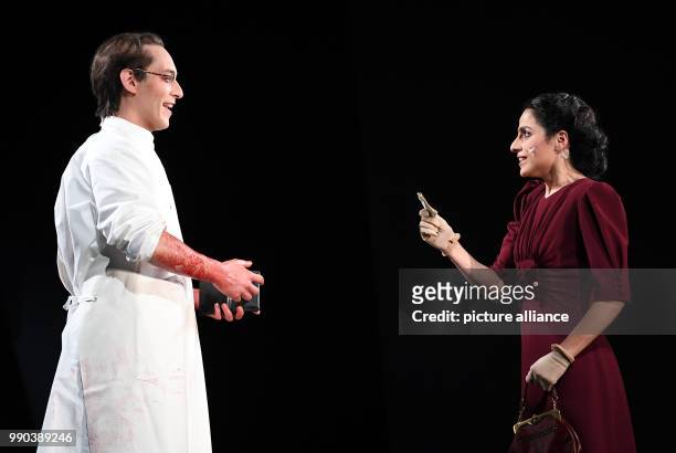 The actors Mehmet Atesci and Sesede Terziyan stand on stage during the picture rehearsal of the play 'Glaube Liebe Hoffnung' at the Maxim Gorki...