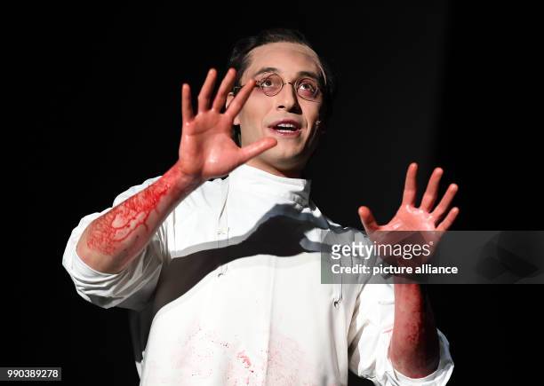 The actor Mehmet Atesci stands on stage during the picture rehearsal of the play 'Glaube Liebe Hoffnung' at the Maxim Gorki Theatre in Berlin,...