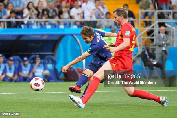 Genki Haraguchi of Japan scores the opening goal with his team mates during the 2018 FIFA World Cup Russia Round of 16 match between Belgium and...