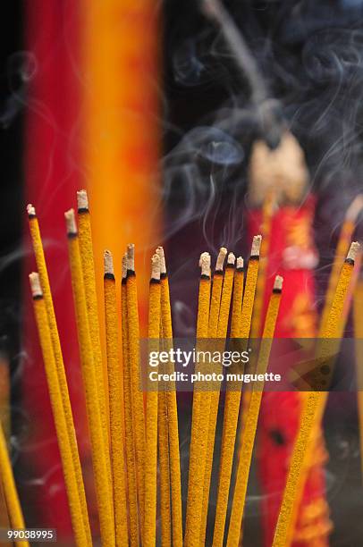 close up of incense sticks burning - thua thien hue province stock pictures, royalty-free photos & images