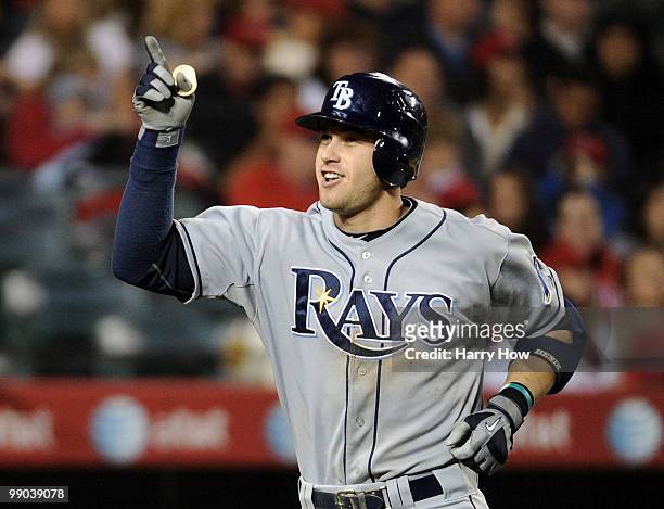 Evan Longoria of the Tampa Bay Rays celebrates his three run homerun for a 6-0 lead over the Los Angeles Angels during the seventh inning at Angels...