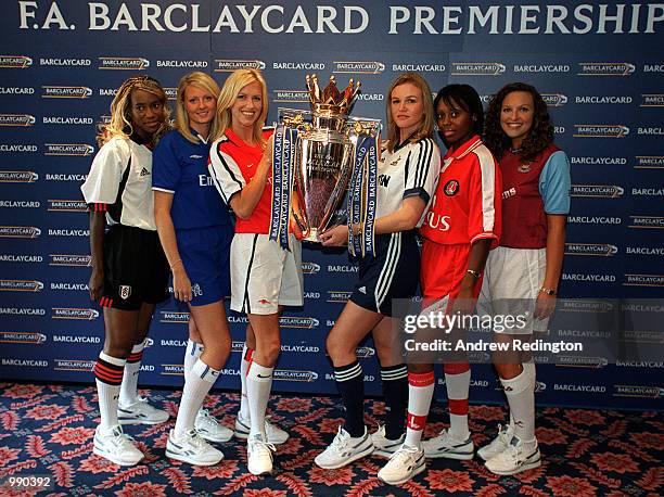 Models dressed in the strips of London's Premiership clubs with the new FA Barclaycard Premiership Trophy at the Royal Lancaster Hotel, London....